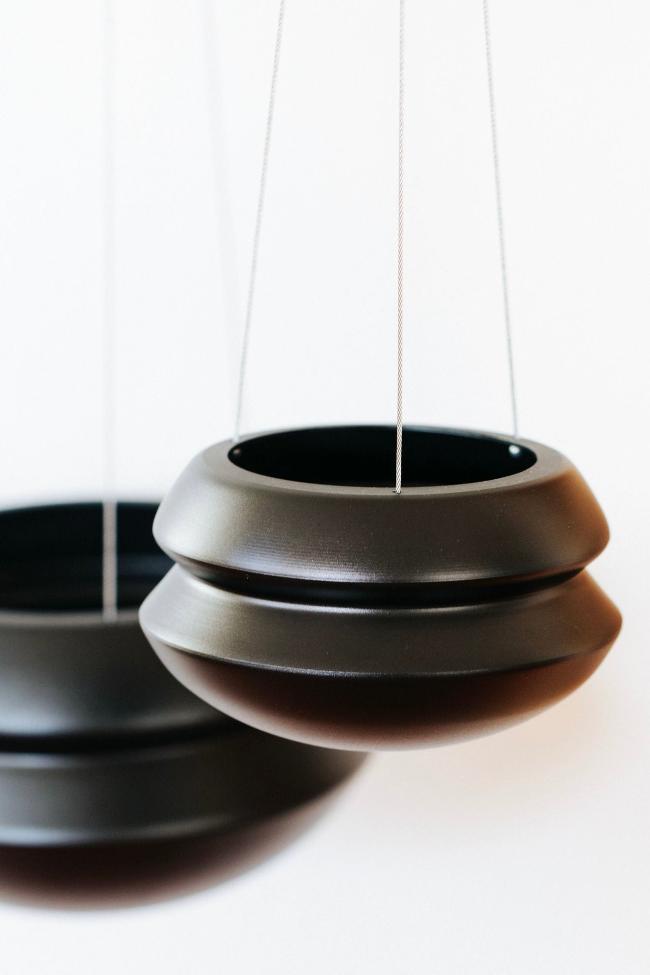 Medium and large midnight halo for size comparison, the large is about 1.5 times the size of the medium. The medium is in the foreground and the large is in the background.